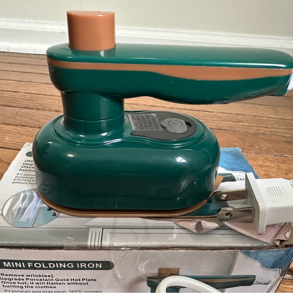 Mini folding iron - perfect for travel - only used once